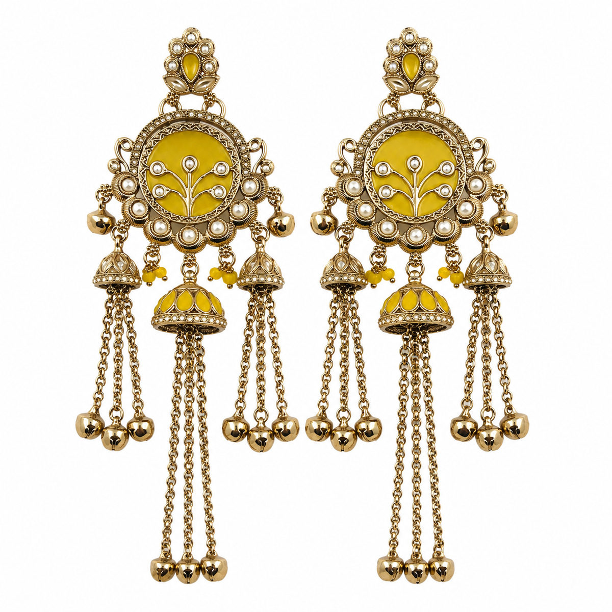 A pair of ornate gold-toned Indian jhumka earrings with bright yellow enamel panels, white faux pearl bead borders, and dangling chain bells on a plain white background.