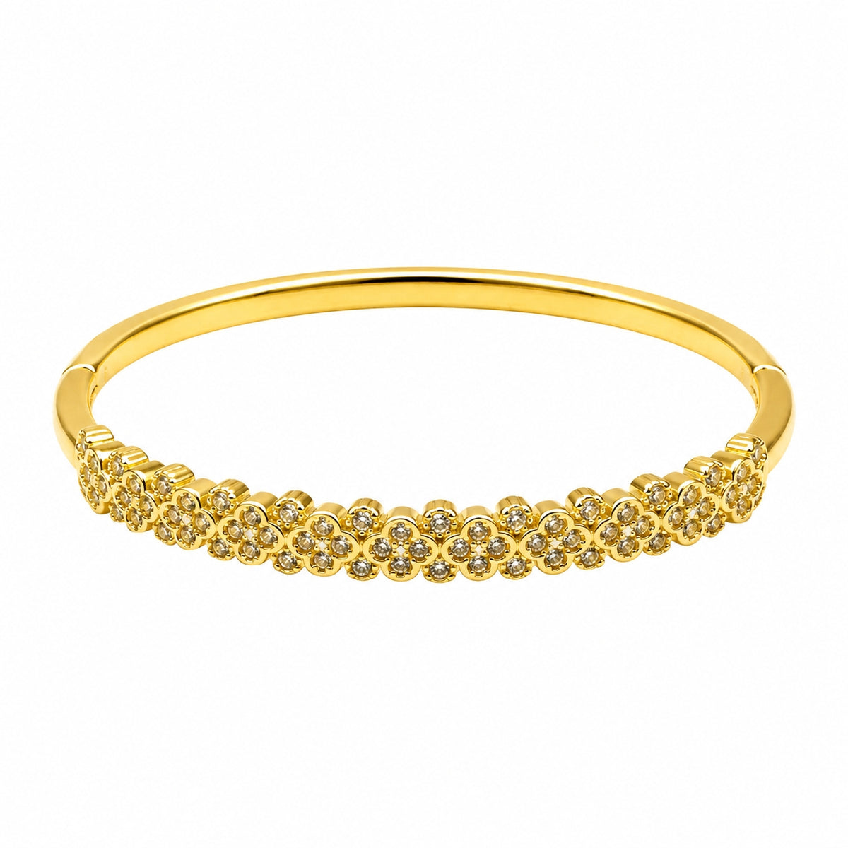 A gold bangle bracelet featuring a row of small pavé-set clear stones across the front, displayed on a clean white background.