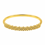 A gold bangle bracelet featuring a row of small pavé-set clear stones across the front, displayed on a clean white background.