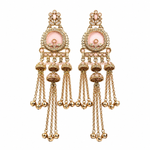 A pair of ornate gold-toned dangle earrings with pale pink oval centers, small clear stones, and multiple dangling chain and bead tassels, shown on a plain white background.