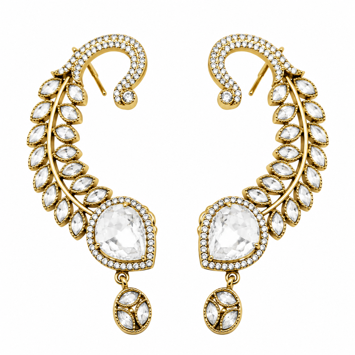 A pair of gold crescent-shaped drop earrings adorned with clear marquise and round gemstones, set against a plain white background.