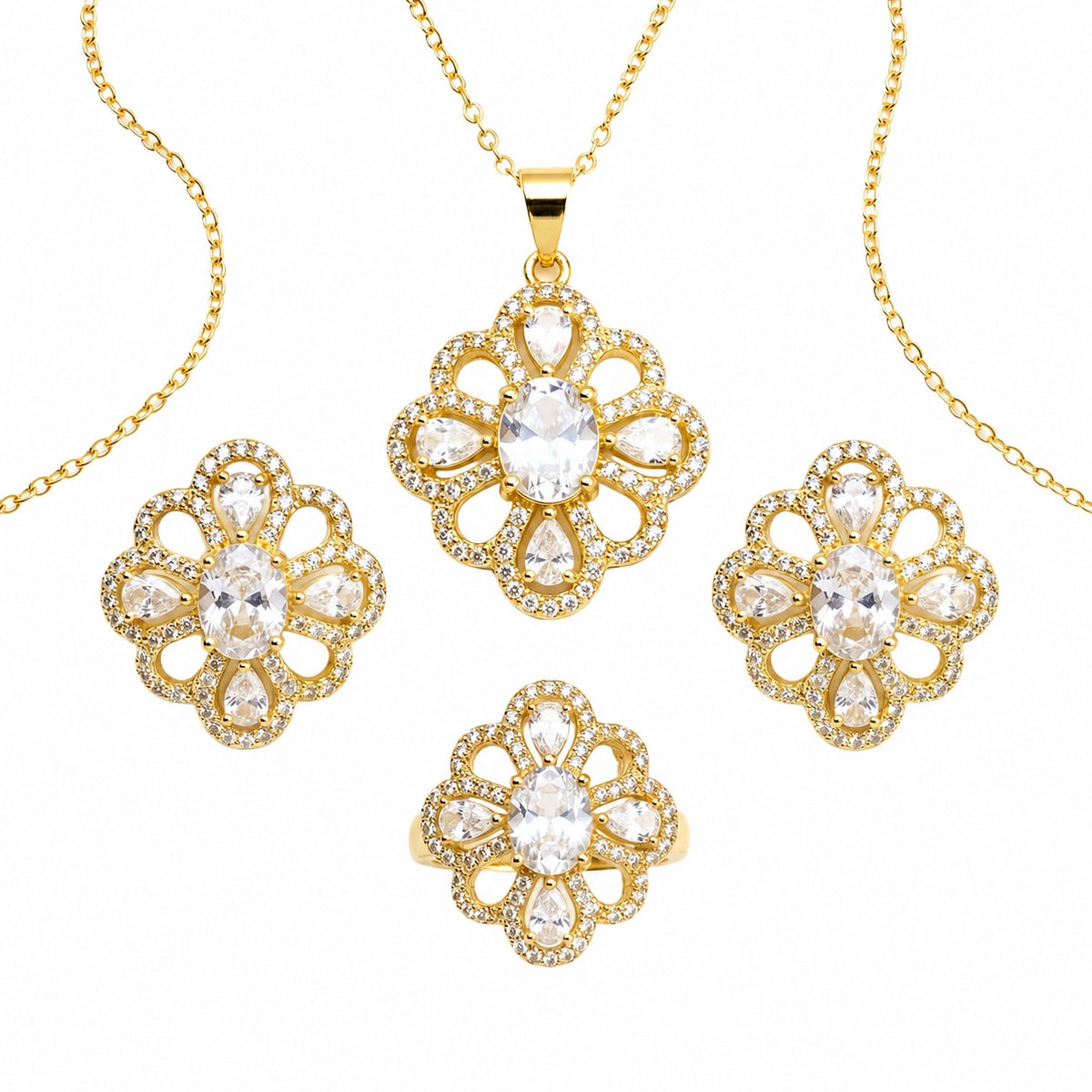 Gold jewelry set featuring a pendant necklace, ring, and two matching earrings, all designed with a floral motif and clear rhinestones on a white background.